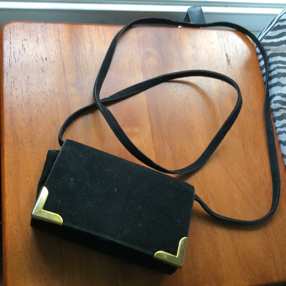 Black handbag with long strap